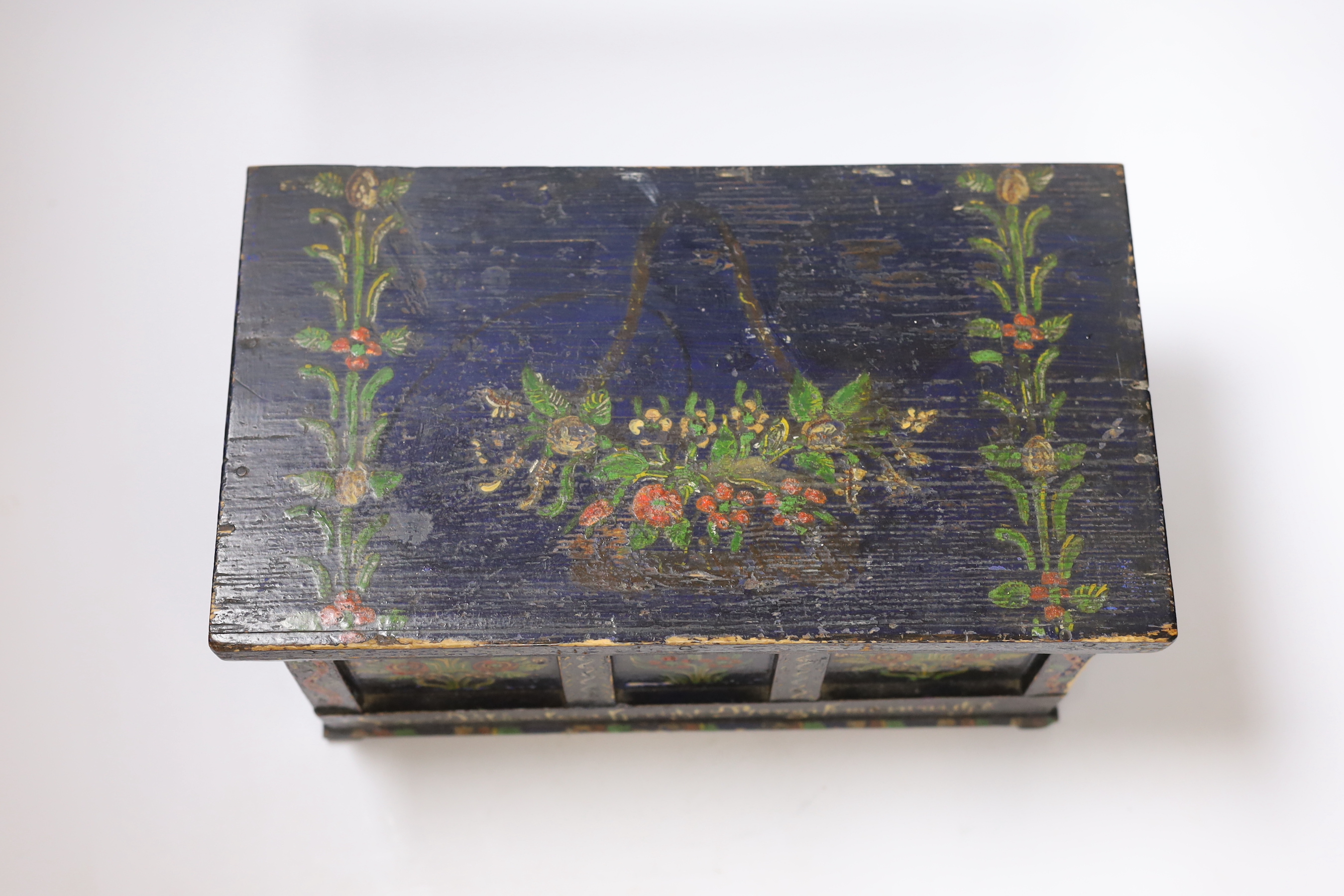 A 19th century German or Austrian floral painted pine casket, 32cm wide